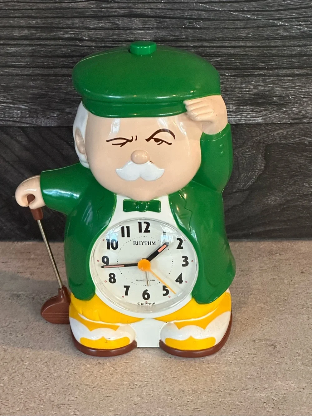 Rhythm Green and Yellow Golfer Novelty Wall Clock